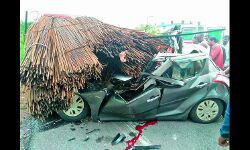 Man dies as car rams illegally parked truck